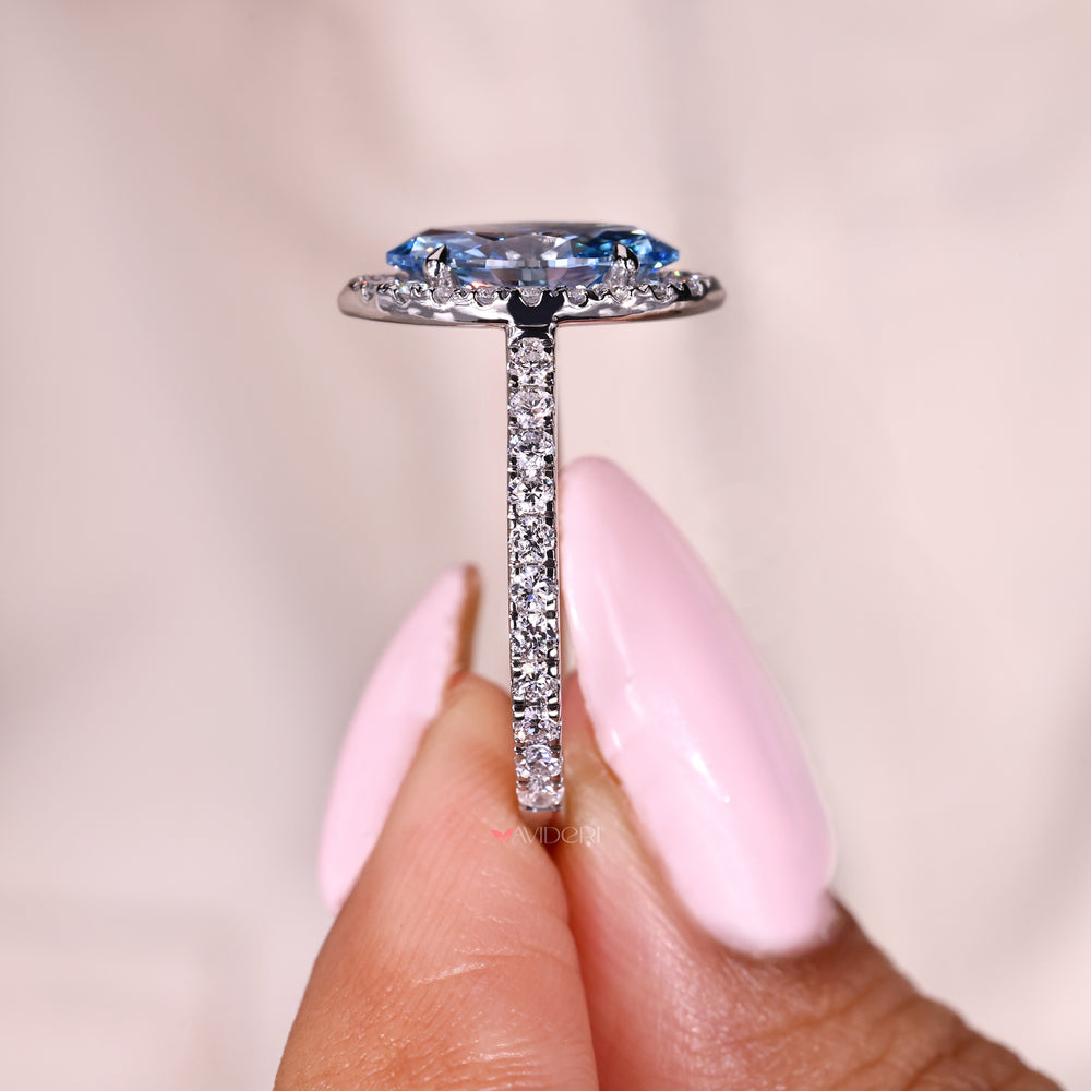 IGI certified marquise blue diamond ring with pave band
