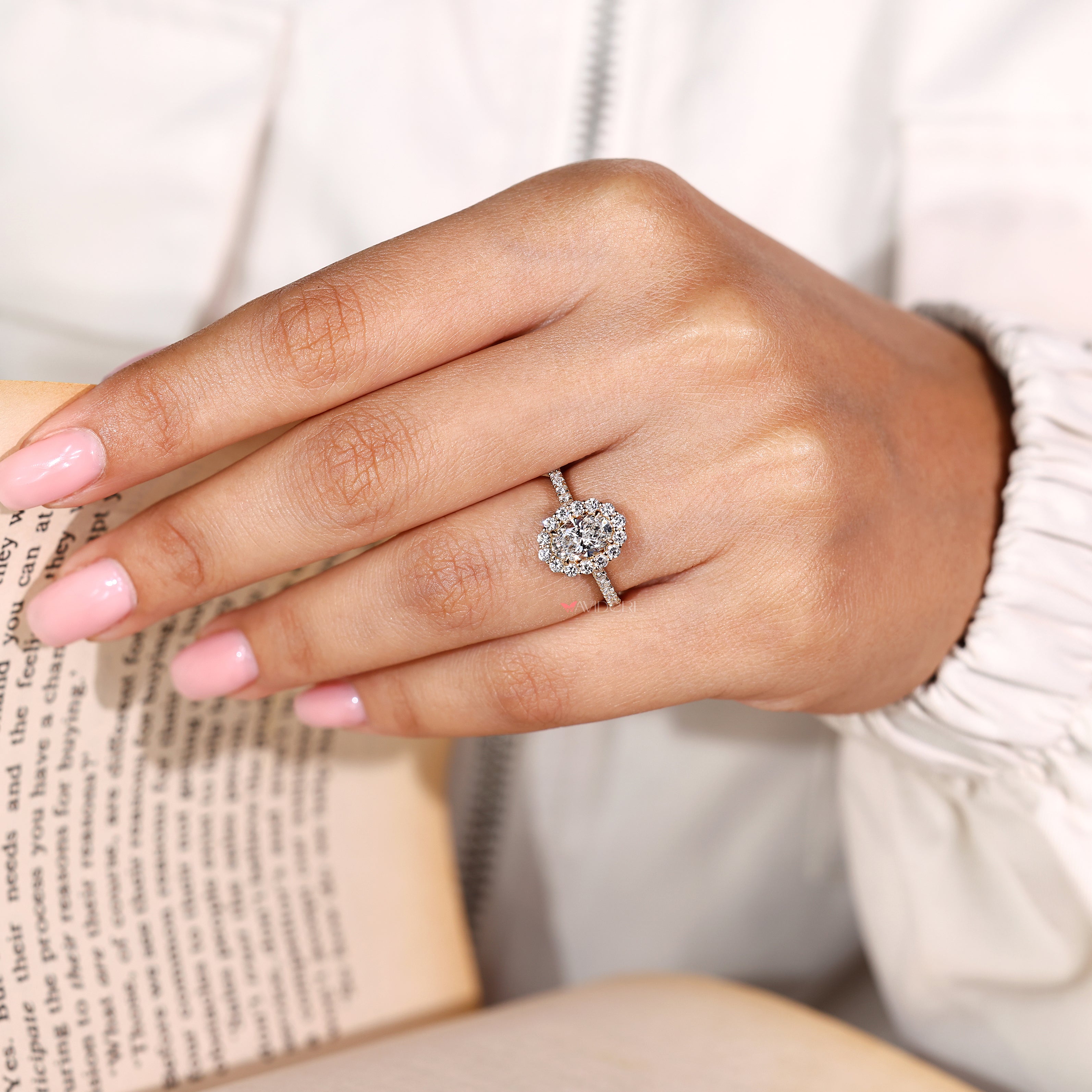 Lab grown oval diamond ring with cathedral setting design
