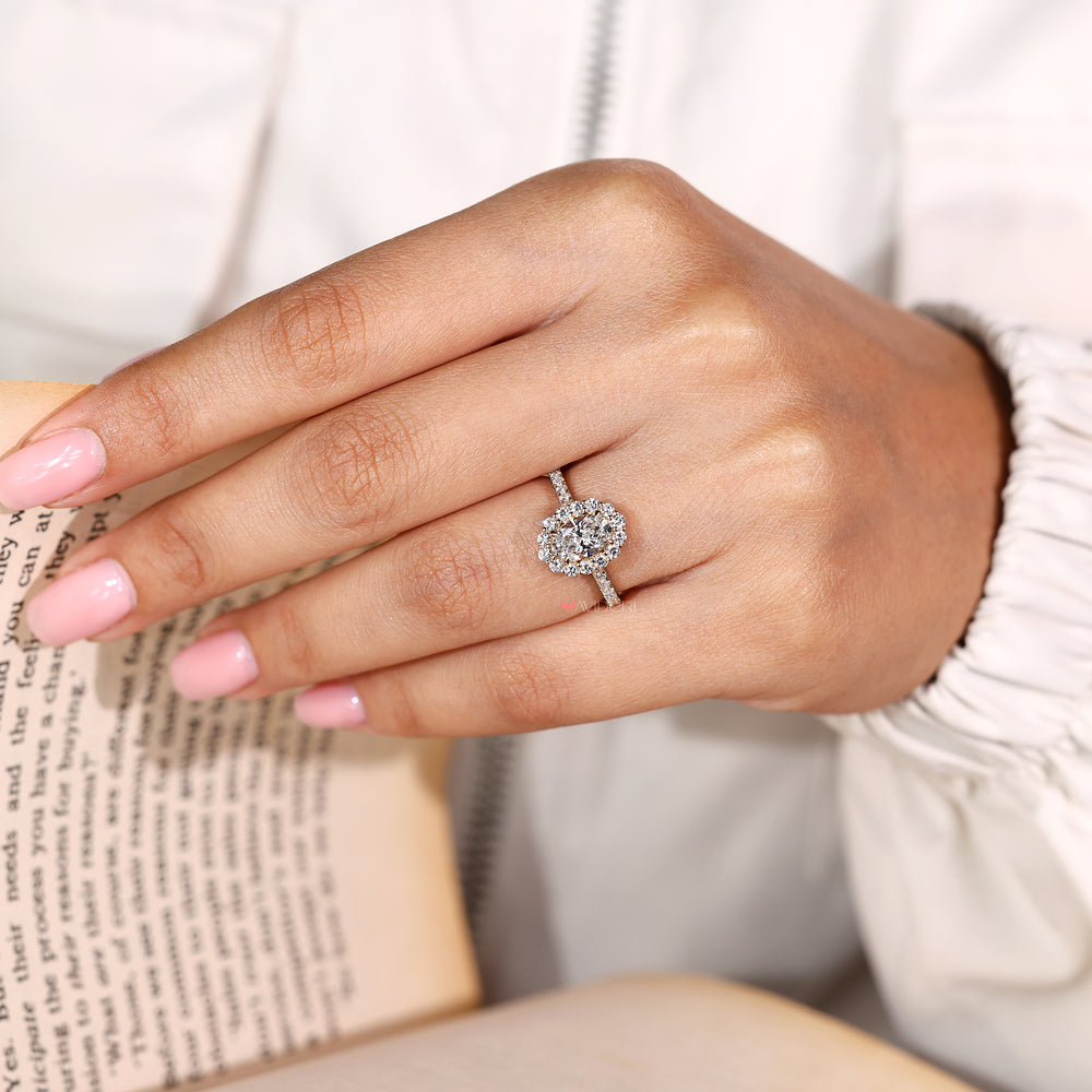 Lab grown oval diamond ring with cathedral setting design
