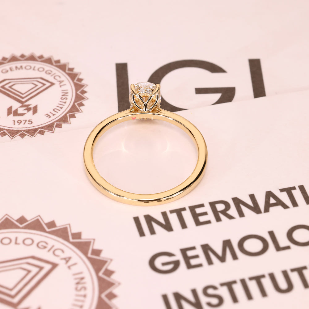 Lab grown oval diamond ring IGI certified.
