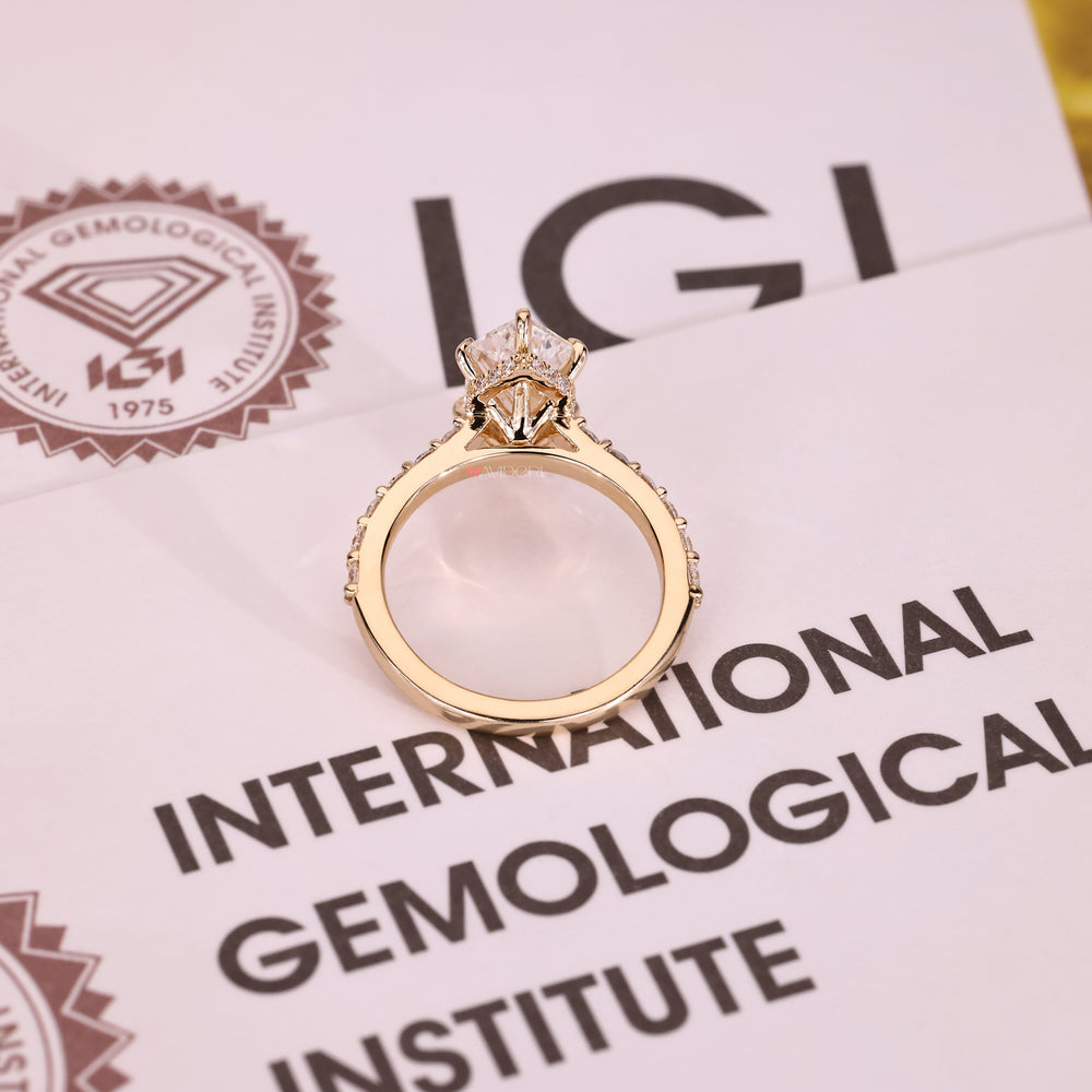 Yellow gold diamond ring with lab-grown diamond ring.
