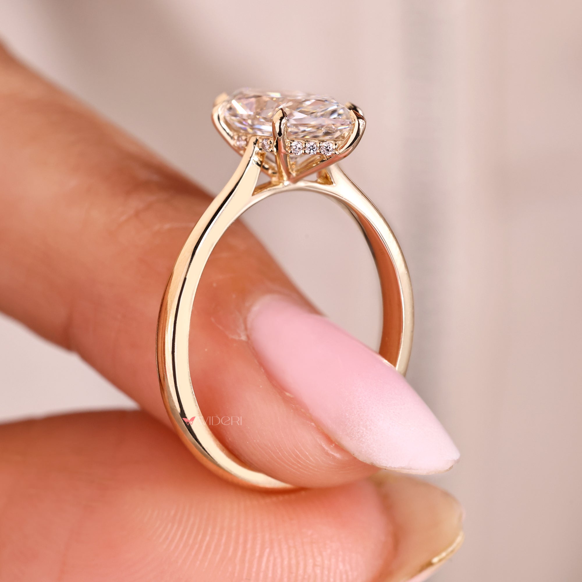 Dutch marquise diamond ring with cathedral setting.
