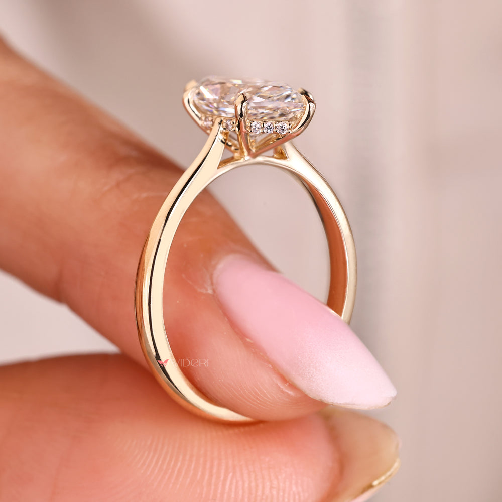 Dutch marquise diamond ring with cathedral setting.
