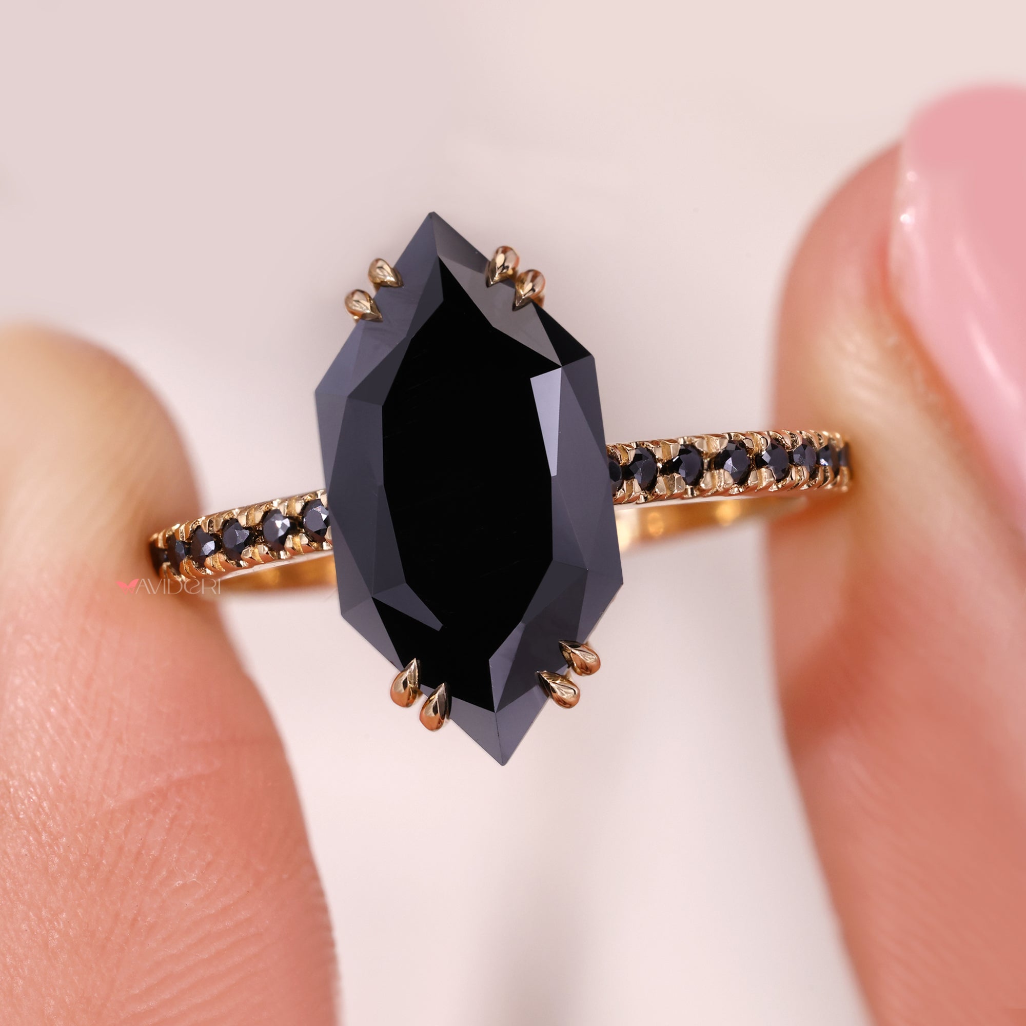 Pave setting ring on double claw prong.