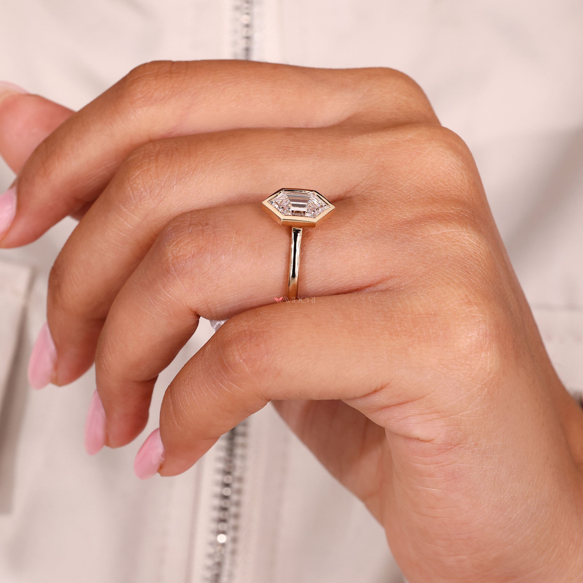 Handmade ring with hexagon diamond in yellow gold.