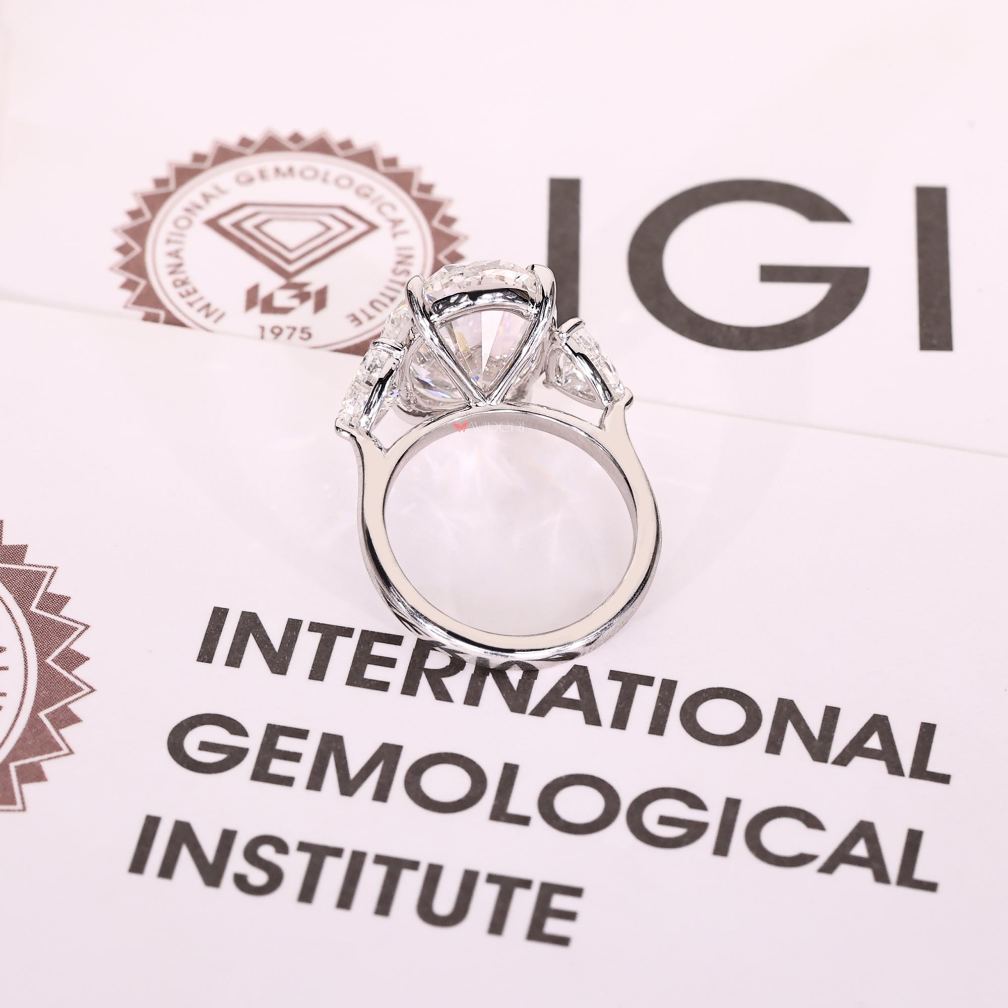 Cathedral Setting Three Stone Diamond Ring.