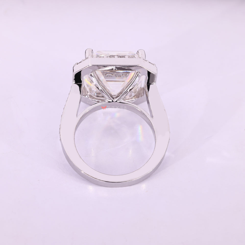 Cathedral setting Asscher cut moissanite halo ring.