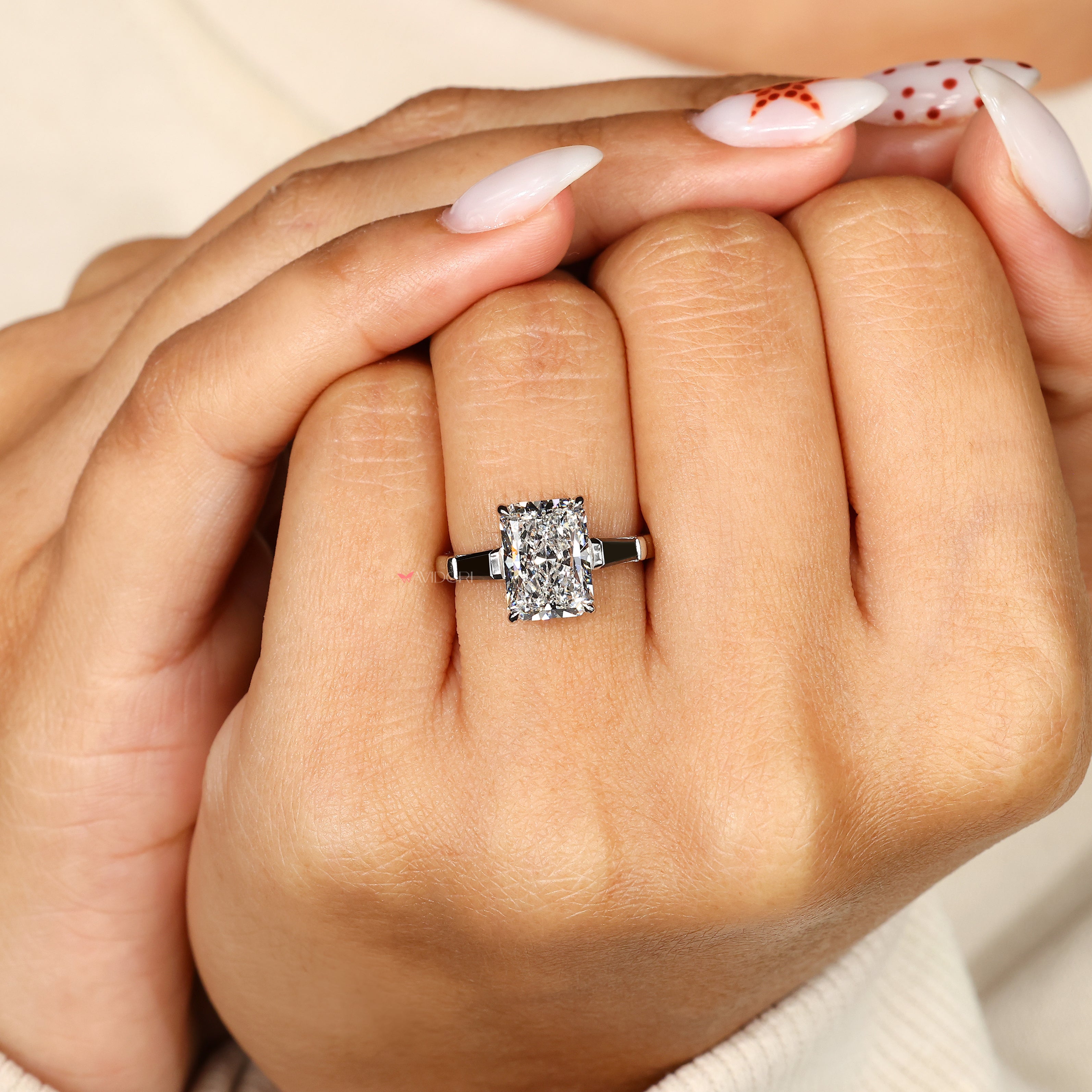 IGI certified radiant cut diamond engagement ring.
