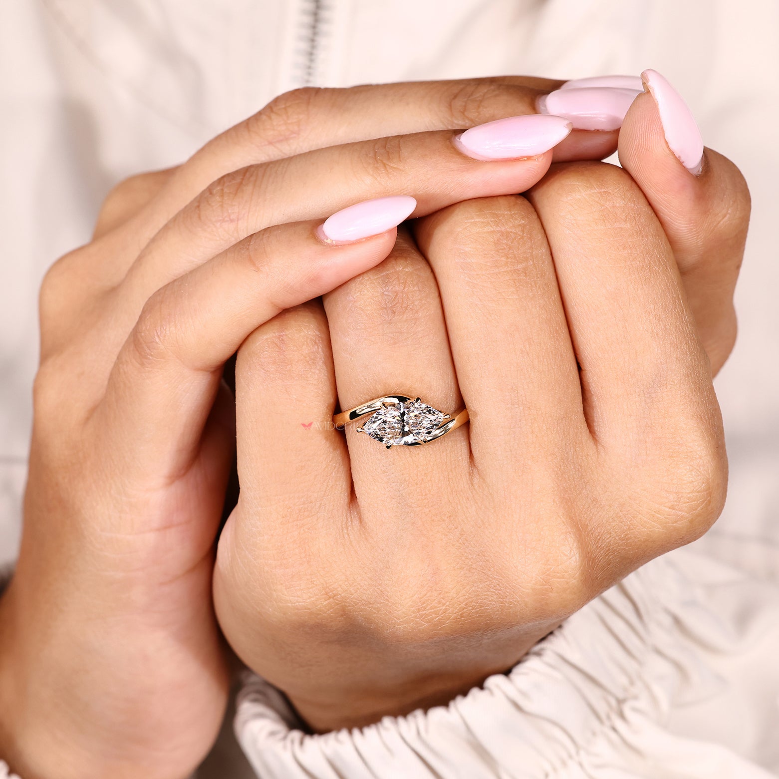 Lab grown marquise ring with solitaire bypass style setting
