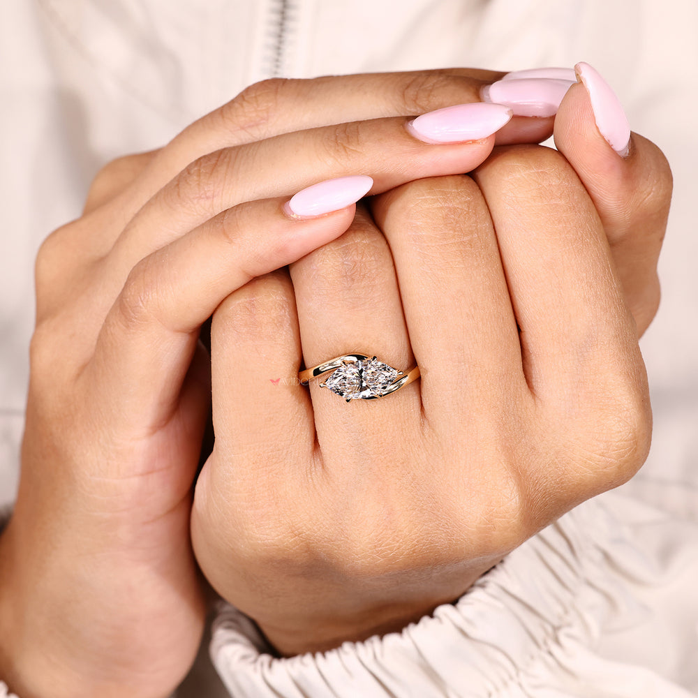 Lab grown marquise ring with solitaire bypass style setting
