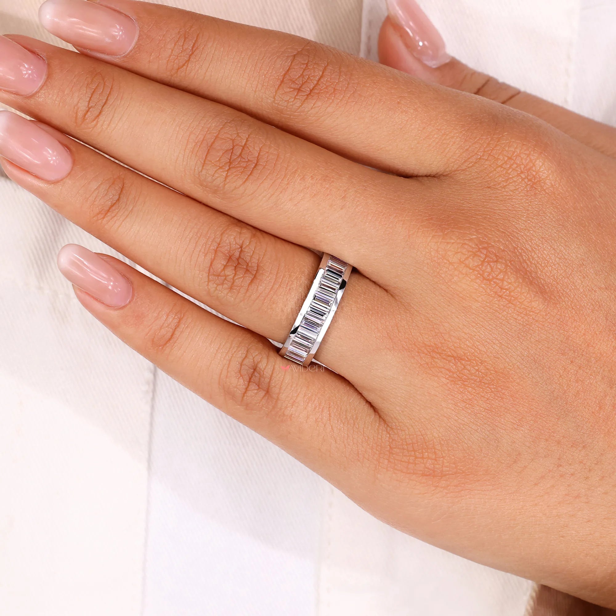Lab grown diamond band with a timeless channel set design, crafted for sophistication.