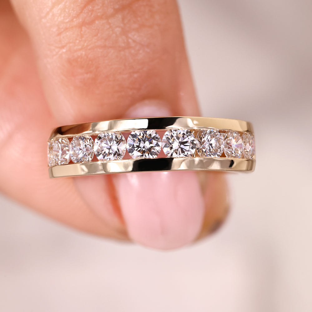 Buy wedding band with unique gold design and detail.