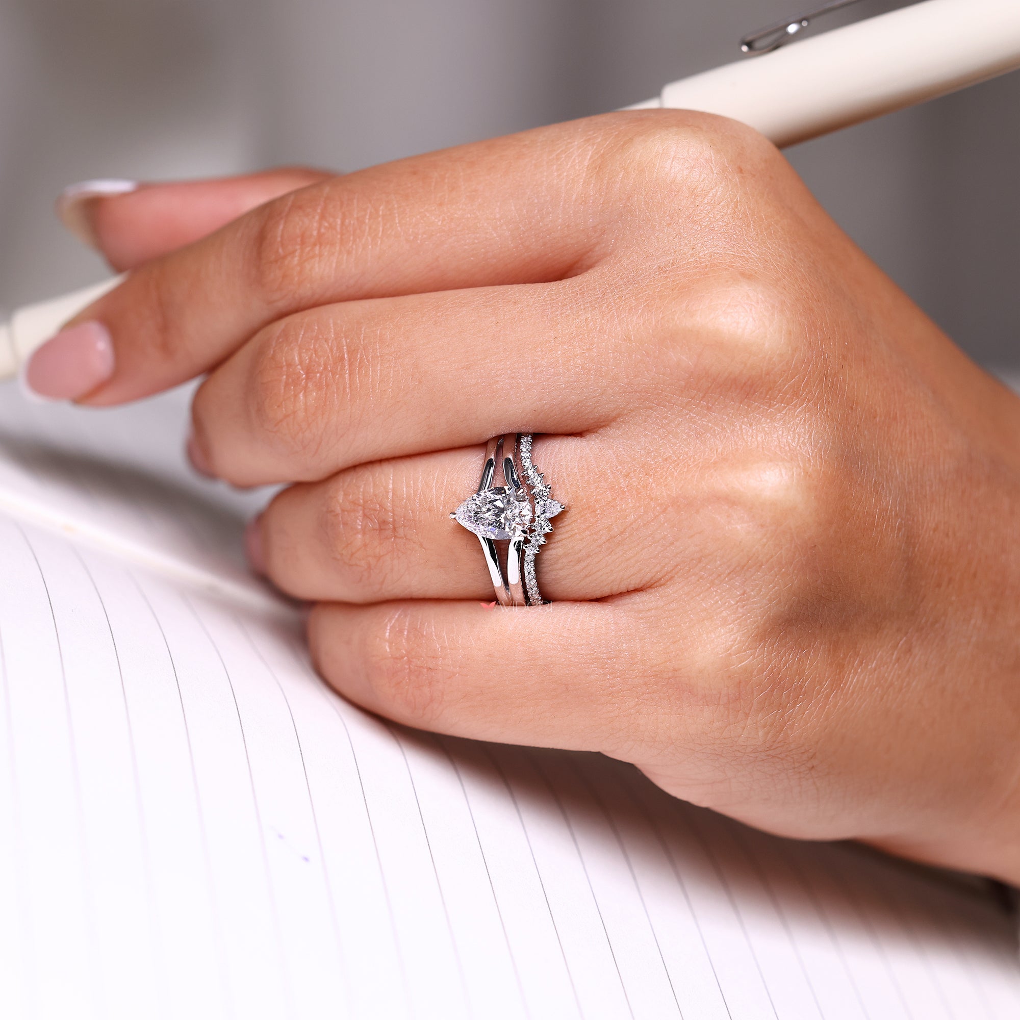 Split shank ring in hidden halo engagement ring.
