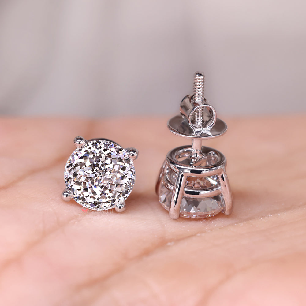 Solitaire diamond earrings and classic stud earrings.
