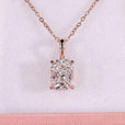 Cushion cut diamond pendant in rose gold with claw prong setting.