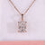 Cushion cut diamond pendant in rose gold with claw prong setting.