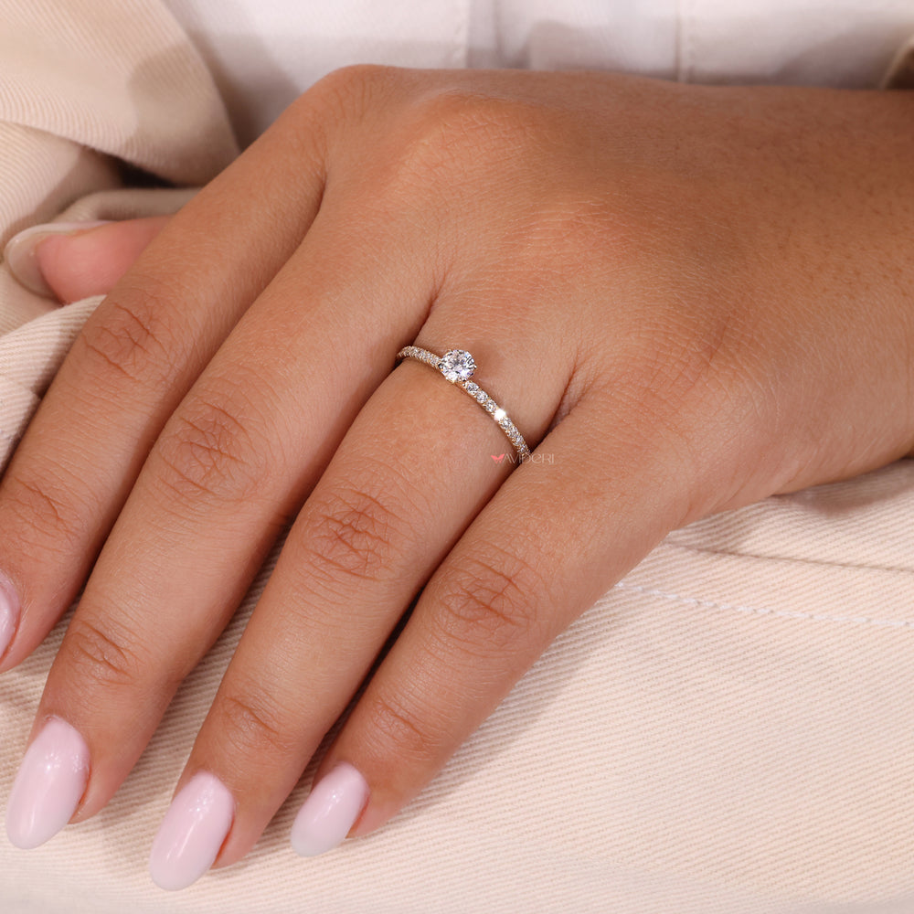 Half eternity band ring with round diamonds set in a beautiful engagement ring.

