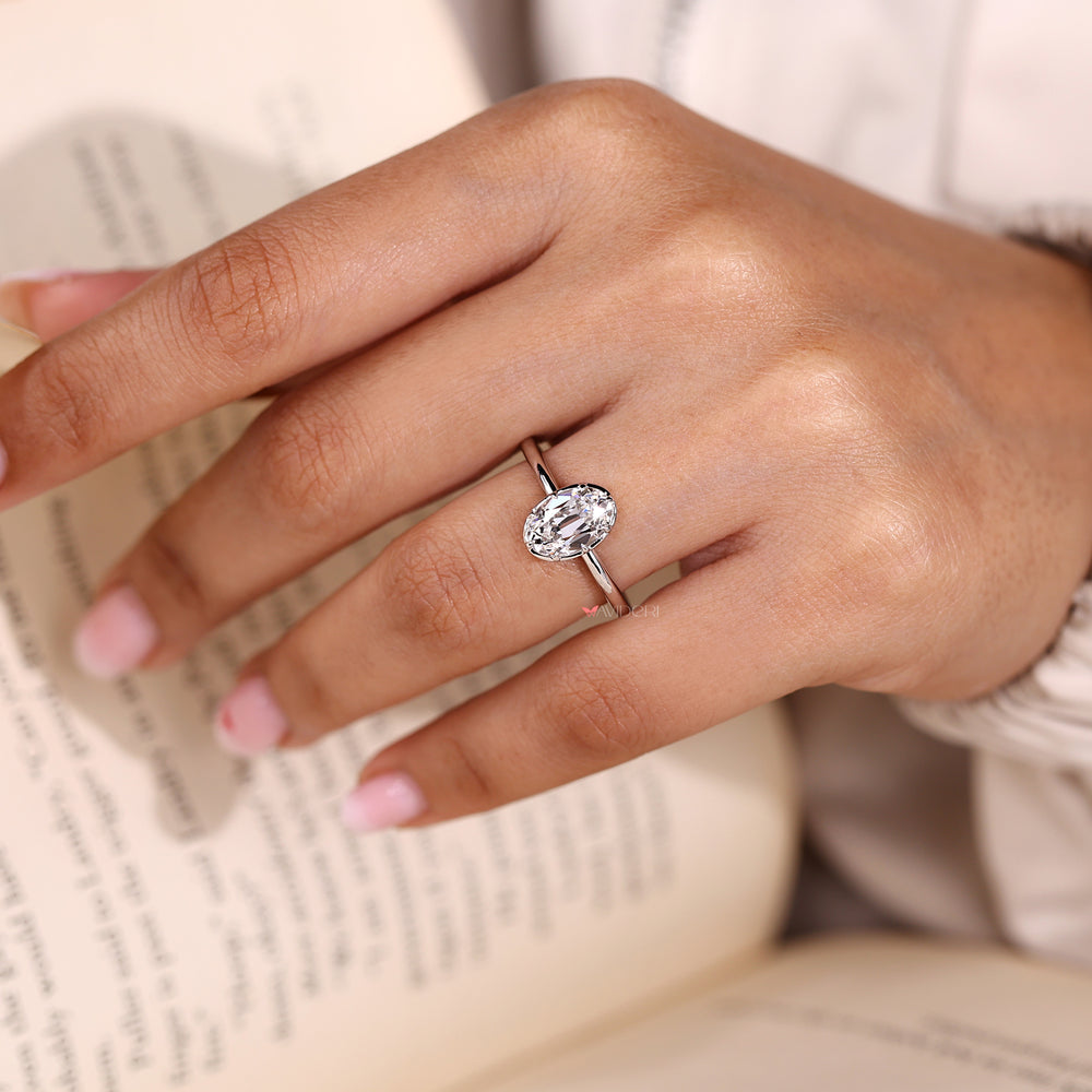 Oval old European cut solitaire diamond engagement ring.