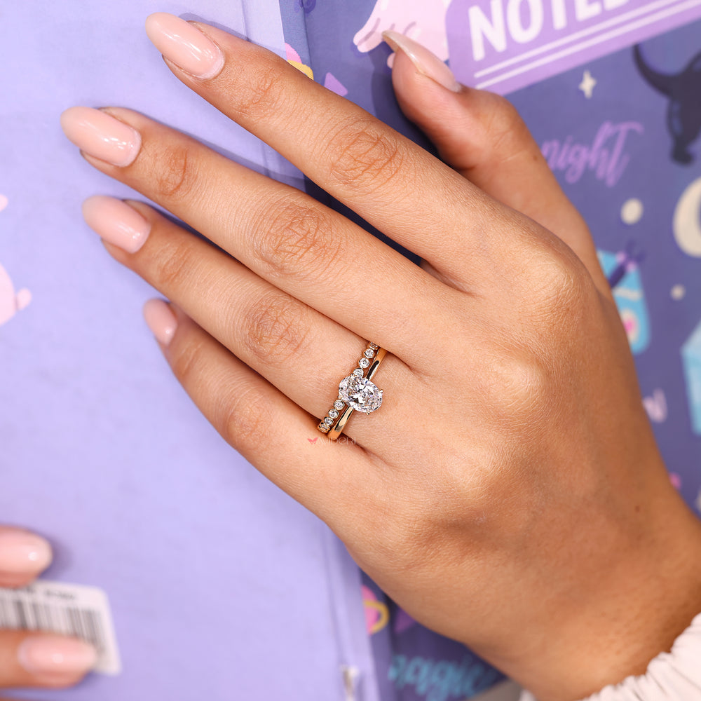 Engagement ring with eternity bezel band set.
