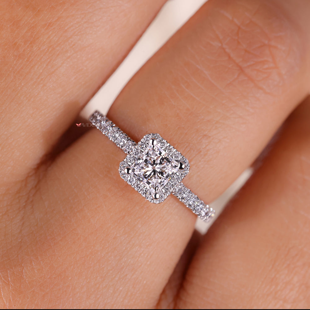 Princess cut with halo showcasing a radiant centerpiece surrounded by intricate detailing, ideal for engagements or special occasions.
