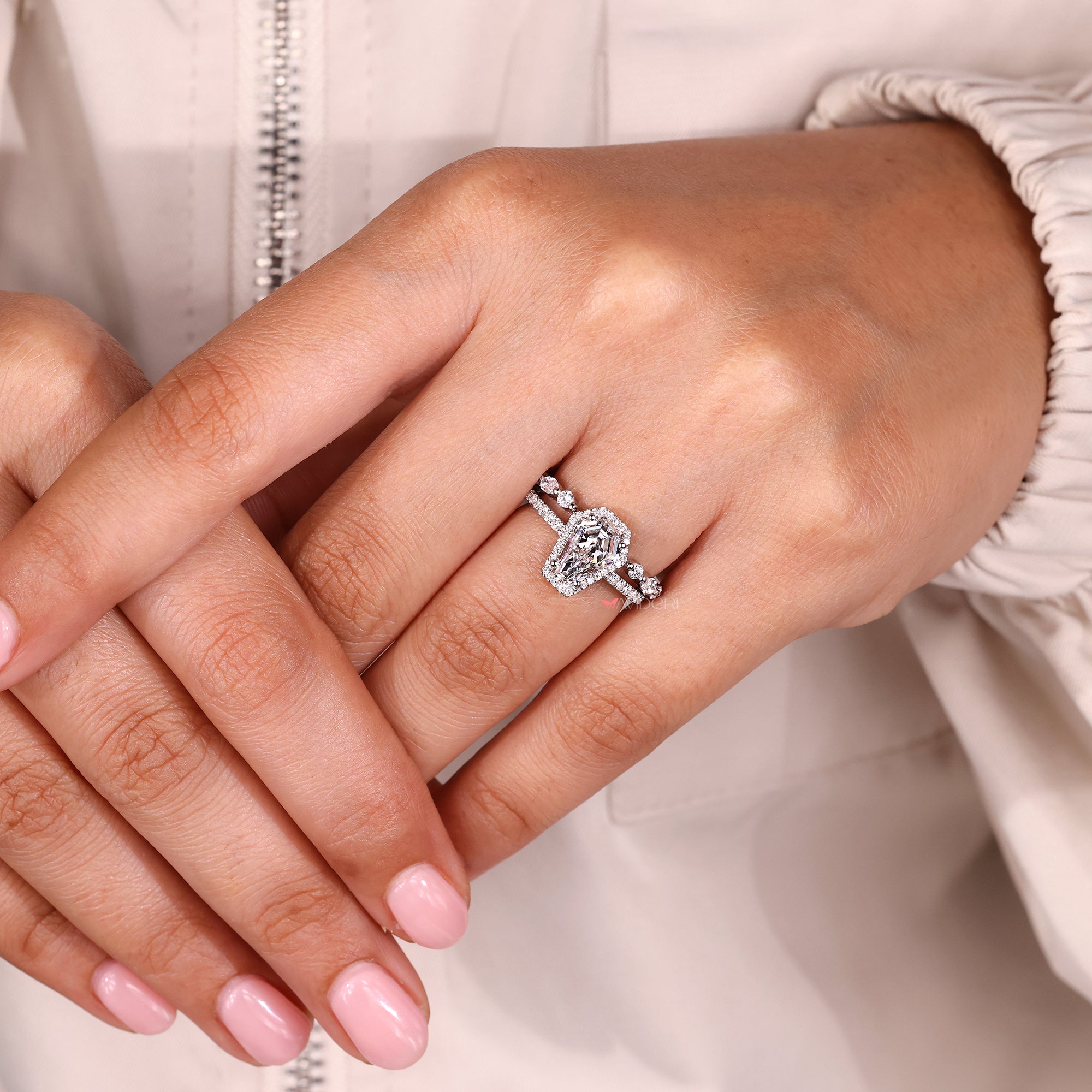 4 prong setting with pave setting band.