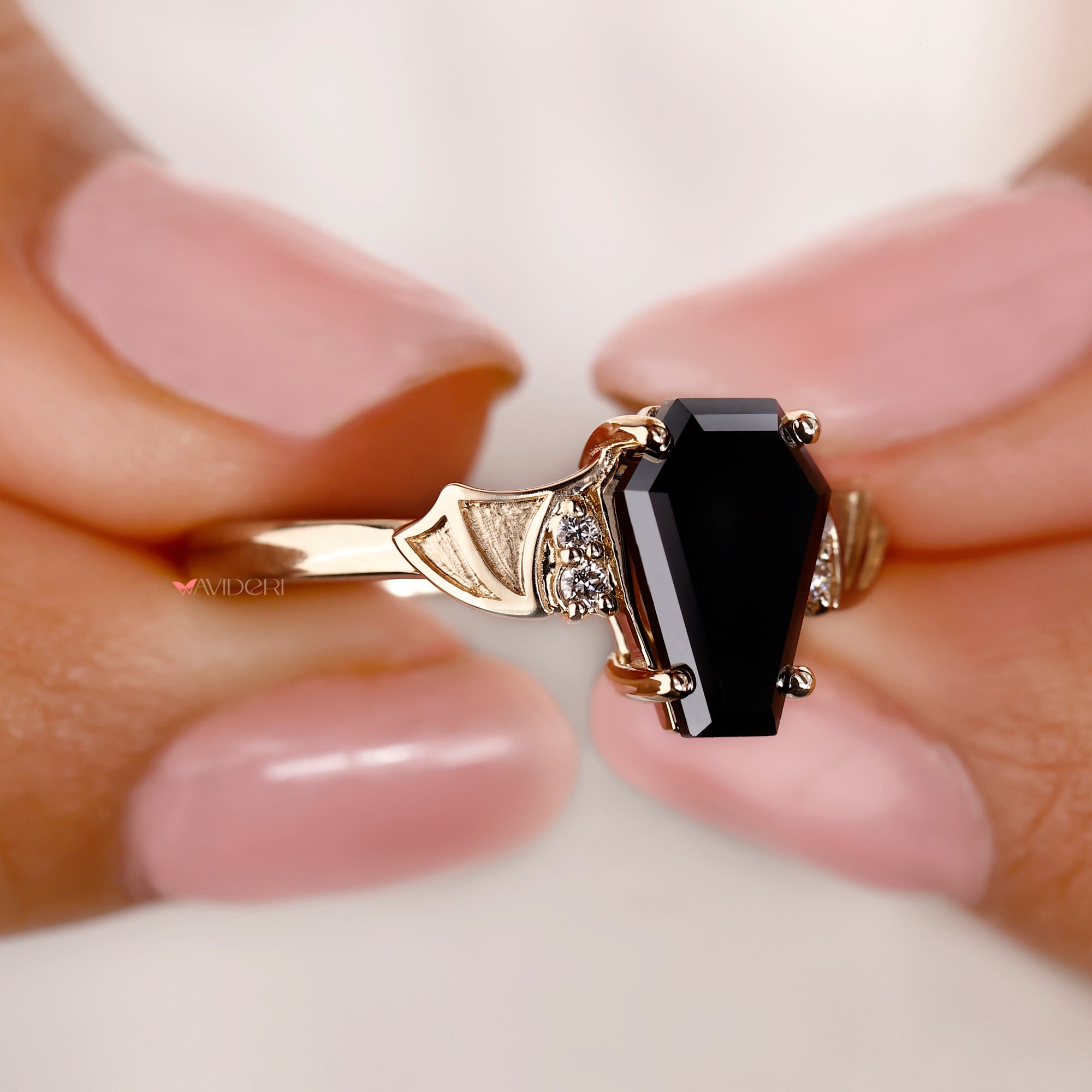 Muse setting ring in 4 prong setting style.