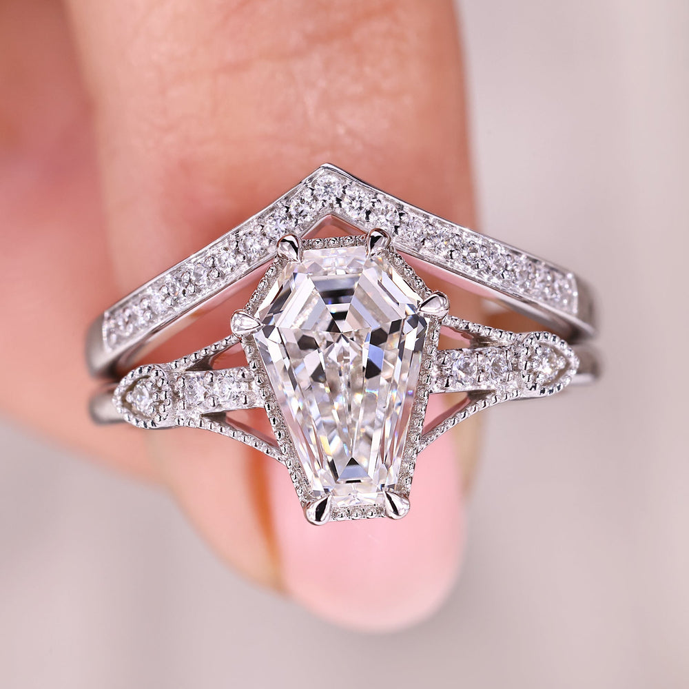 Round diamond wedding band styled with art deco coffin cut engagement ring.