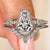 Diamond bridal set with a coffin cut center stone.

