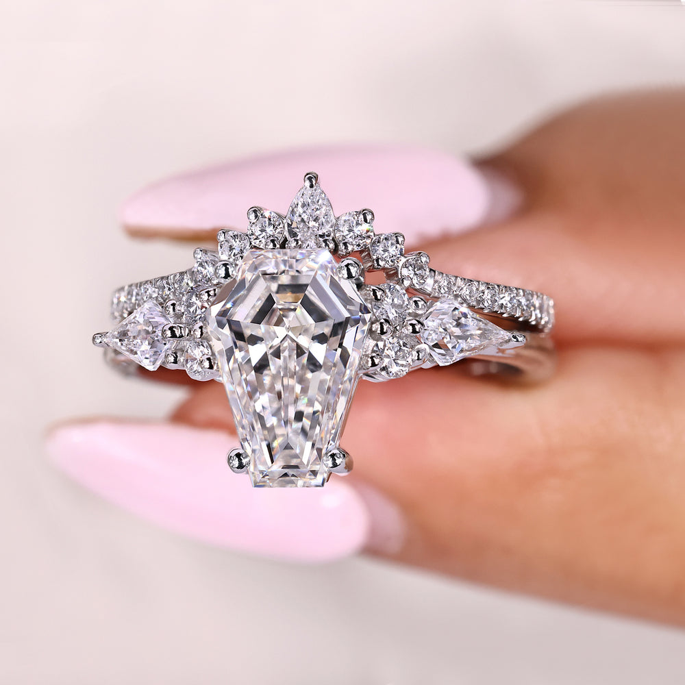 Engagement ring set with curvy band and basket setting
