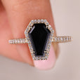 Coffin cut engagement ring with black coffin cut ring.