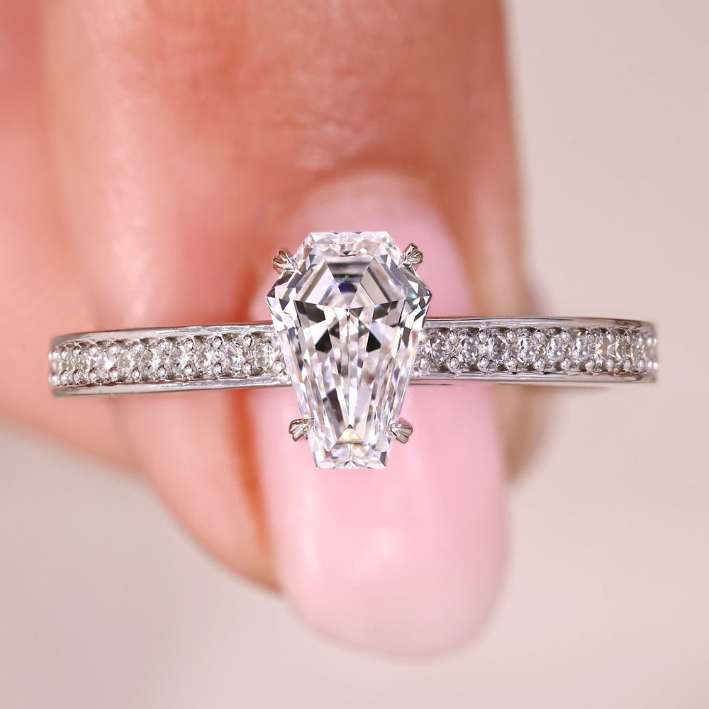 Coffin cut engagement ring with heart shape prong.