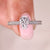 Coffin cut engagement ring with heart shape prong.