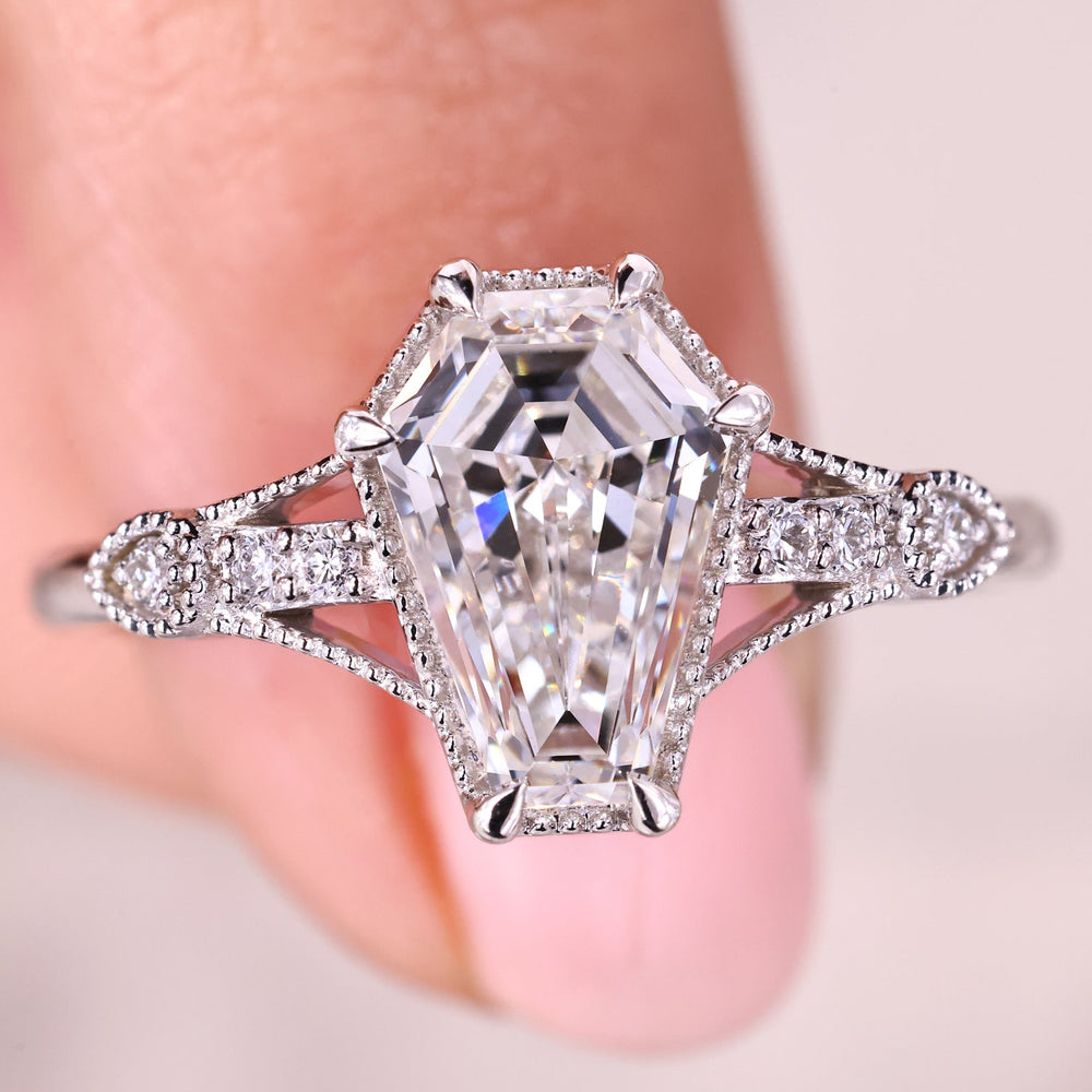 Coffin cut engagement ring with art deco diamond ring.