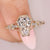 Art Deco diamond ring with coffin cut engagement design.