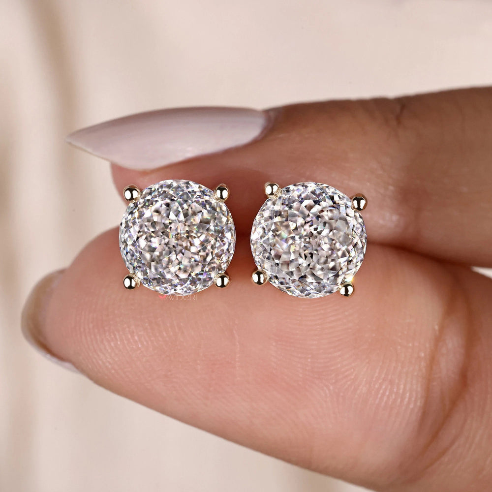Wedding gifts for women featuring handmade earrings in yellow gold.