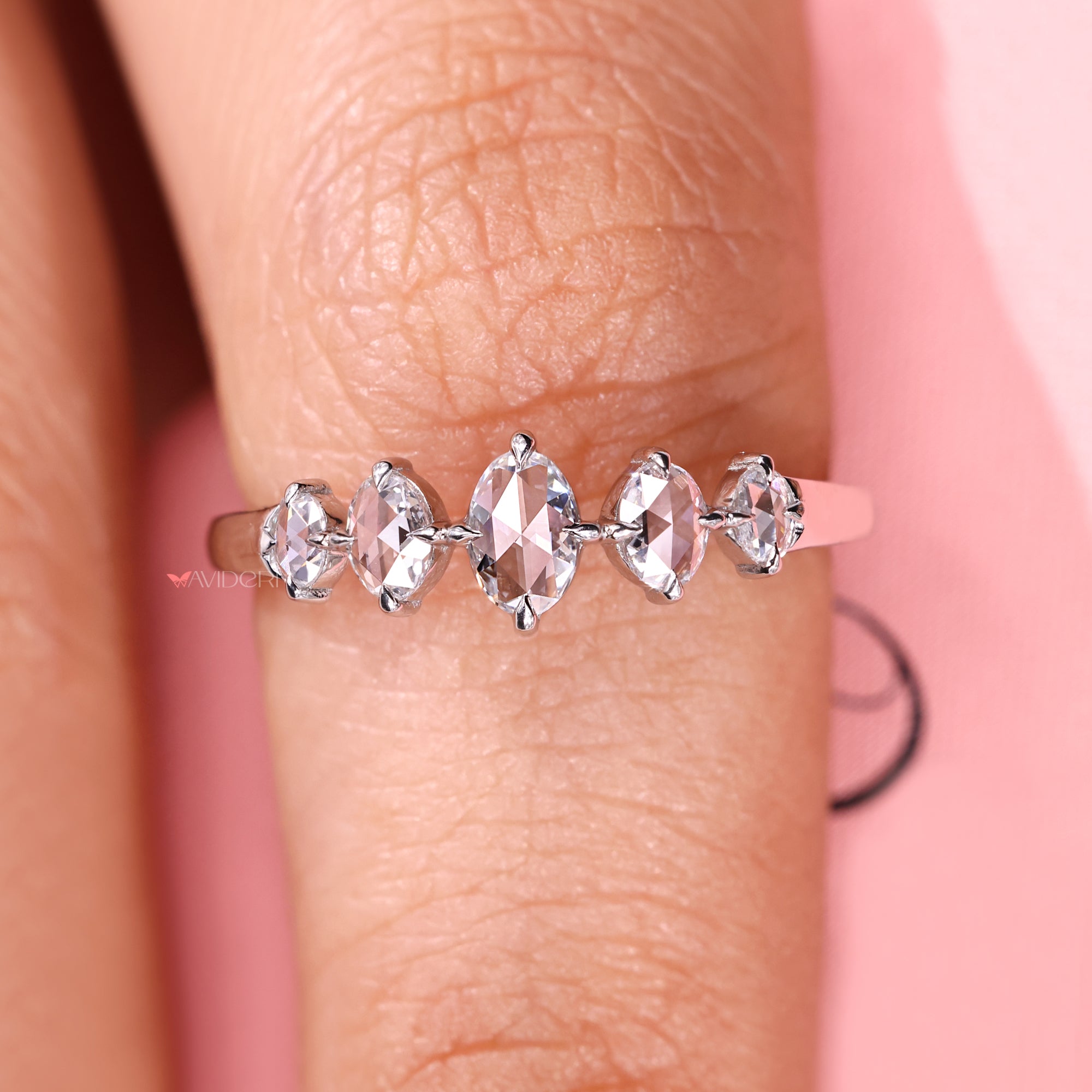 Avideri wedding band with oval stones.