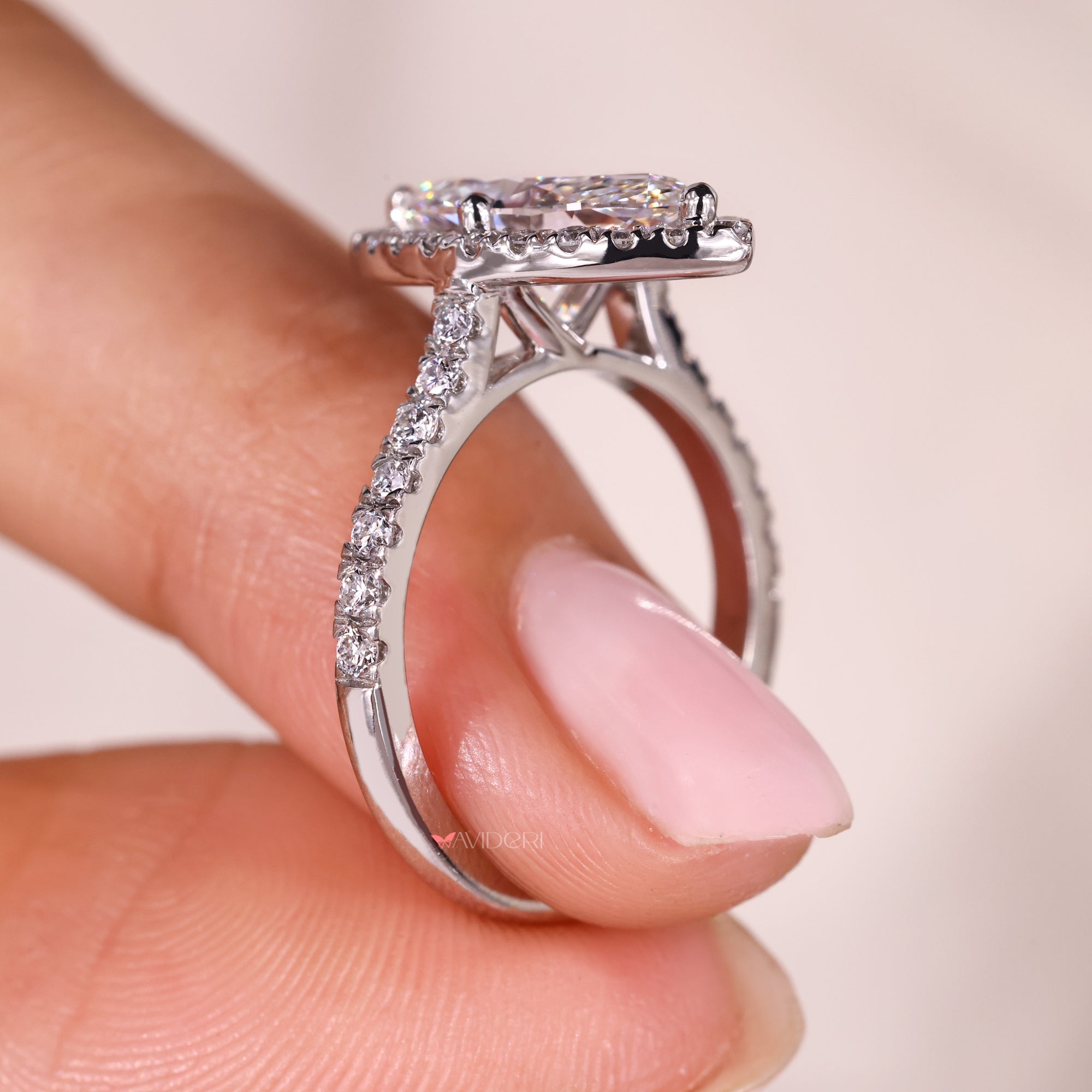 Cathedral setting engagement ring with handmade jewelry.