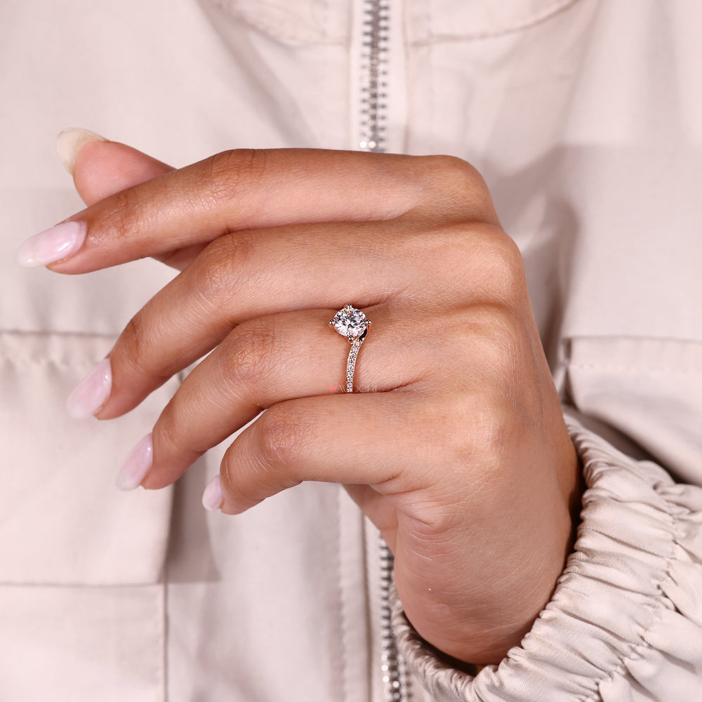 Handmade round diamond engagement ring design.
