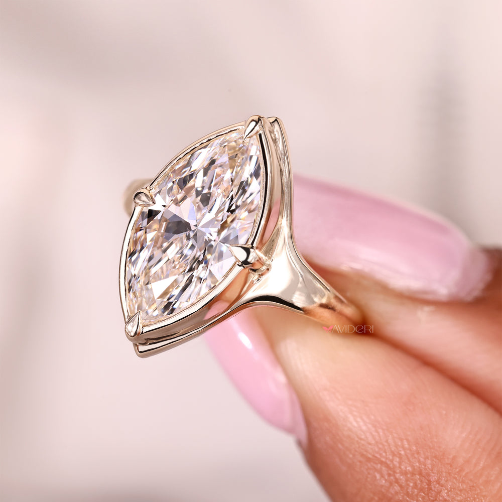 Avideri marquise solitaire diamond ring design.