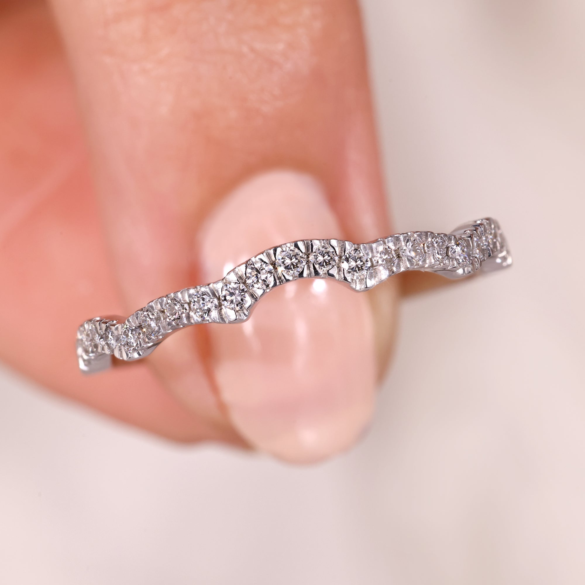 Handmade band with intricate detailing and craftsmanship.