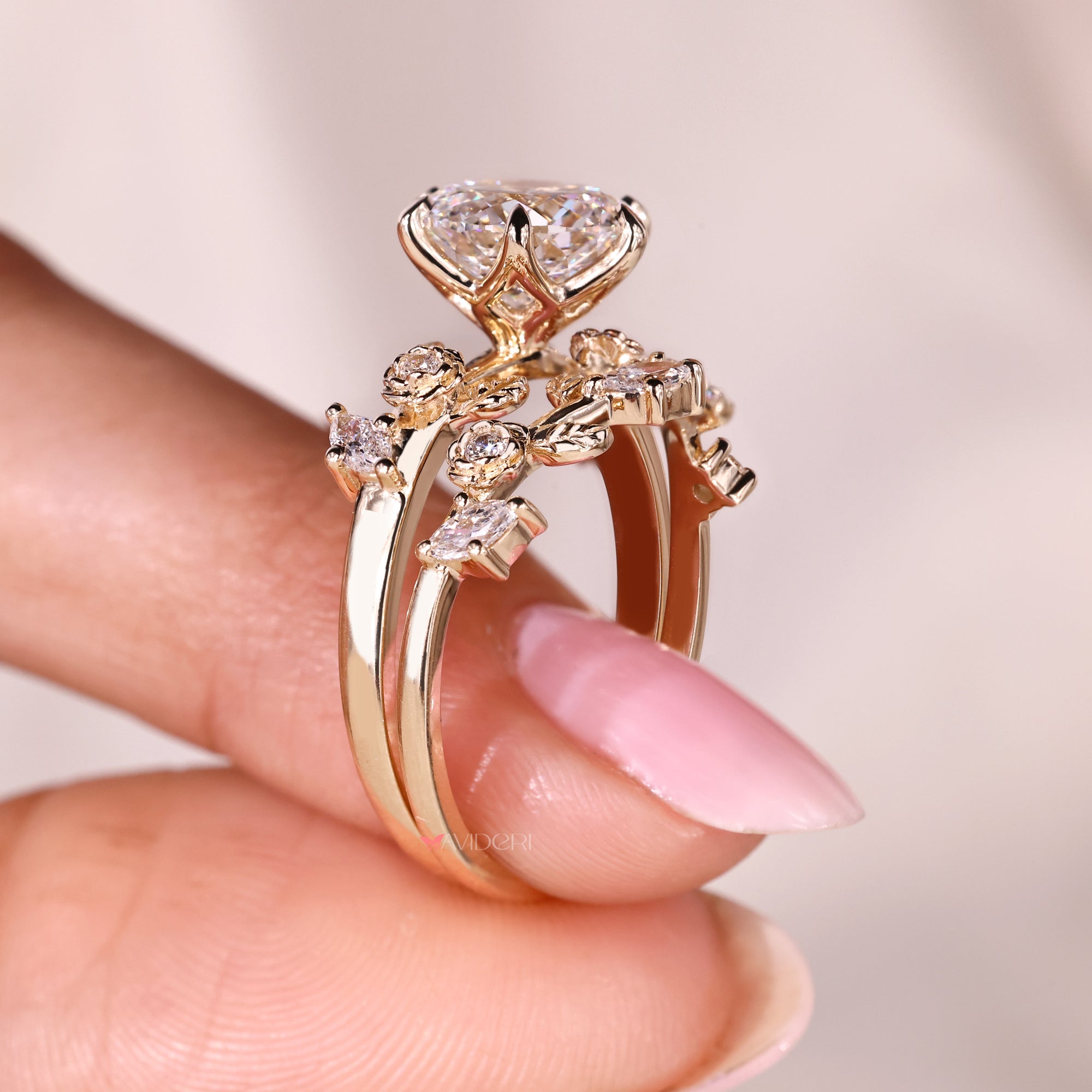 Six claw prong Portuguese cut diamond ring with marquise and round band
