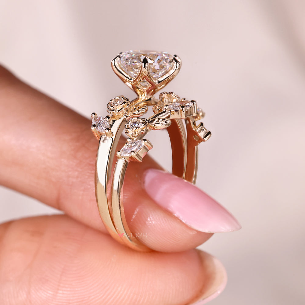Six claw prong Portuguese cut diamond ring with marquise and round band
