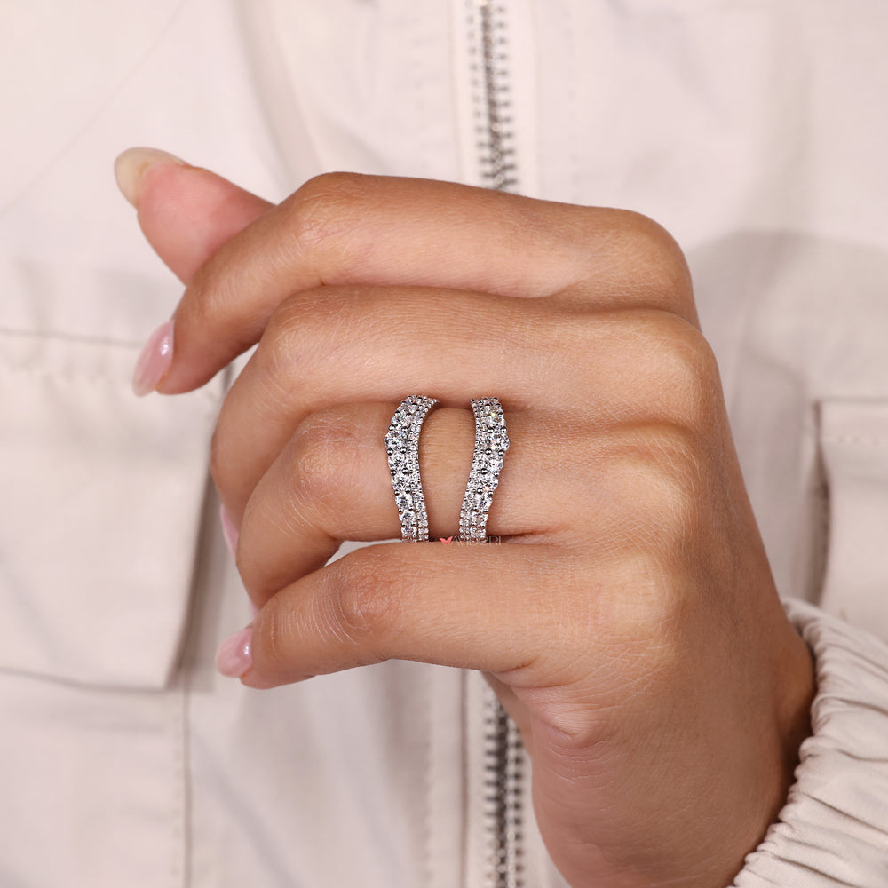 Handmade curved wrap guard moissanite band.
