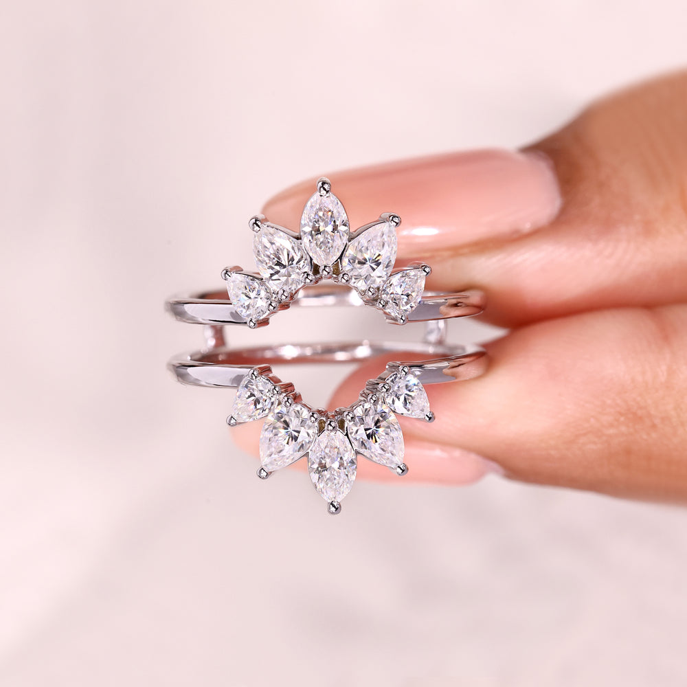 Marquise and pear moissanite curved enhancer ring.
