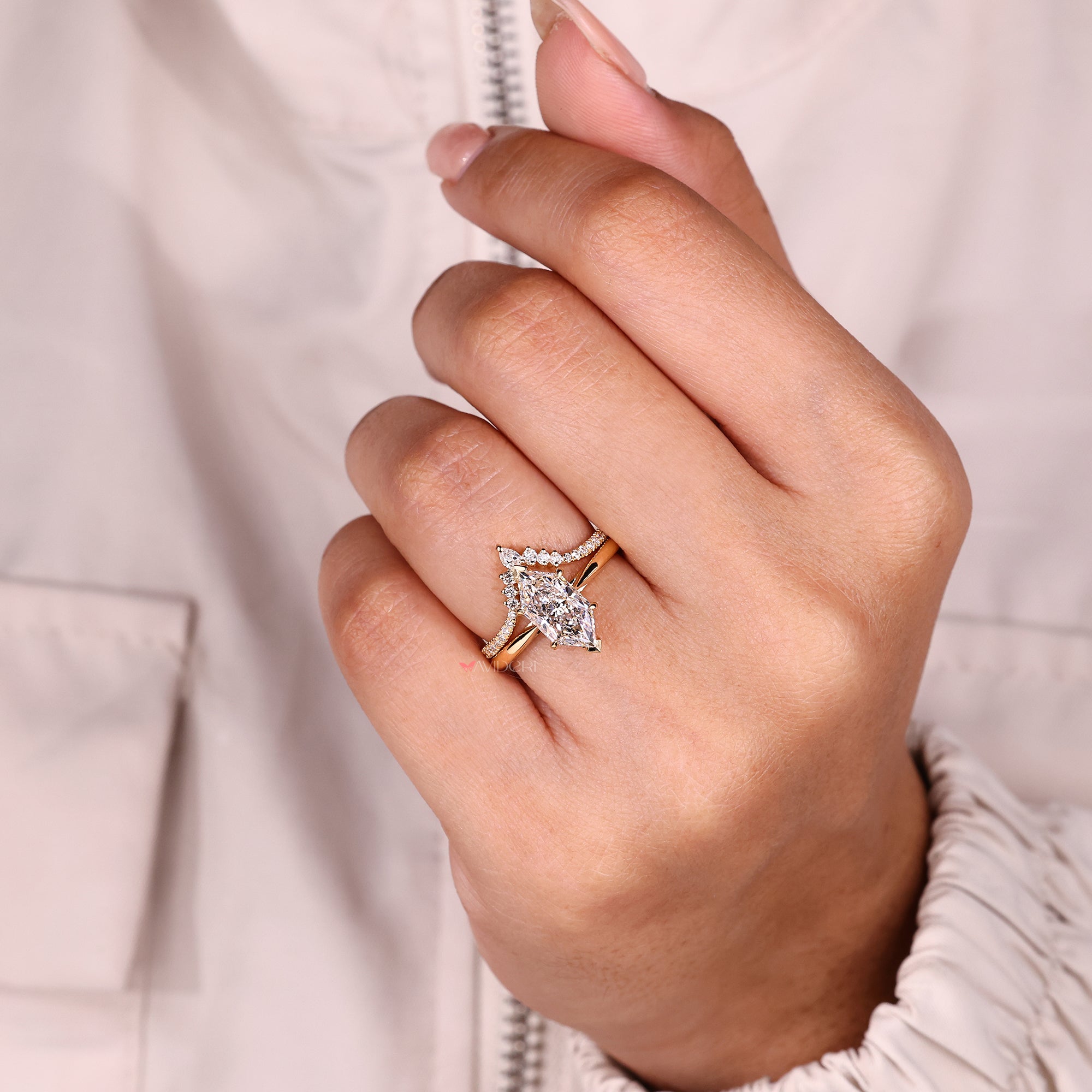 Lab grown Dutch marquise ring with curved band.
