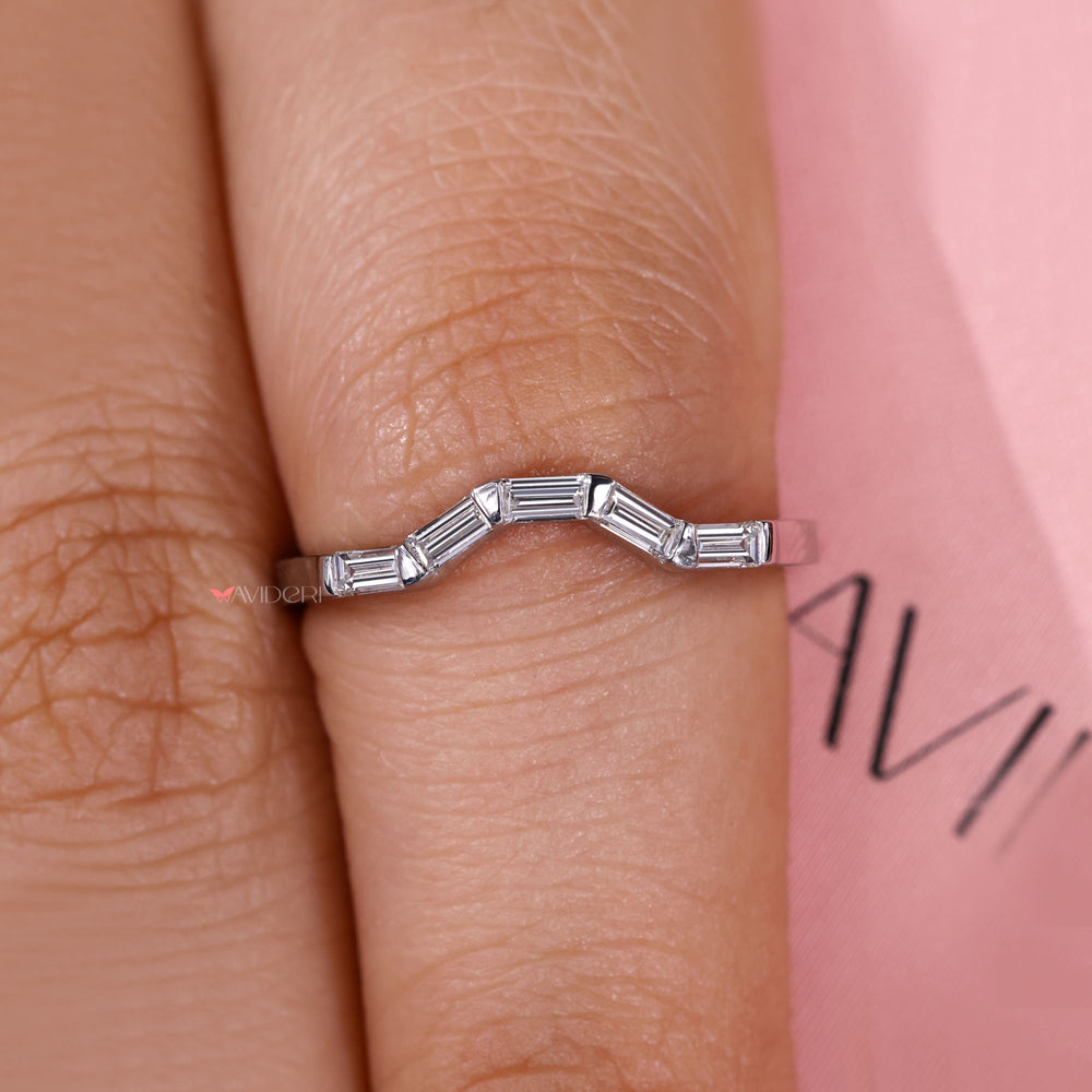 Modern curved baguette diamond band.
