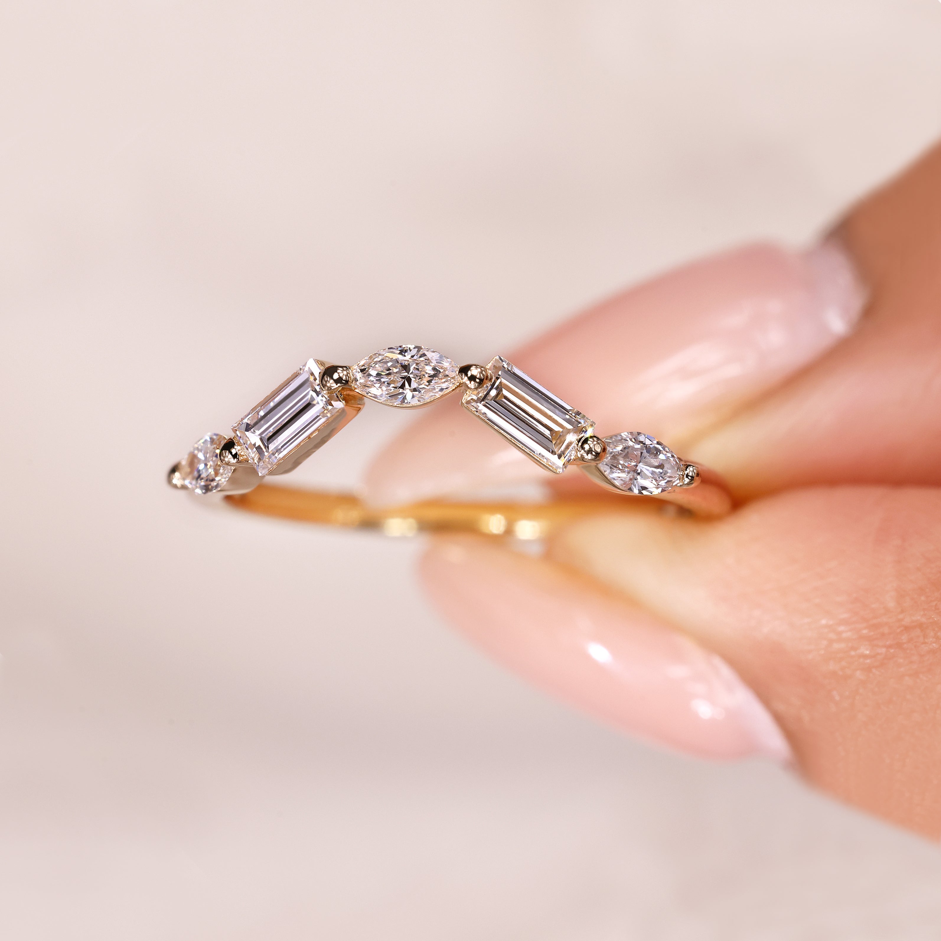 Half eternity wedding band with marquise diamond accents design.
