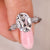 Cushion Old European Cut diamond engagement ring with cathedral setting.