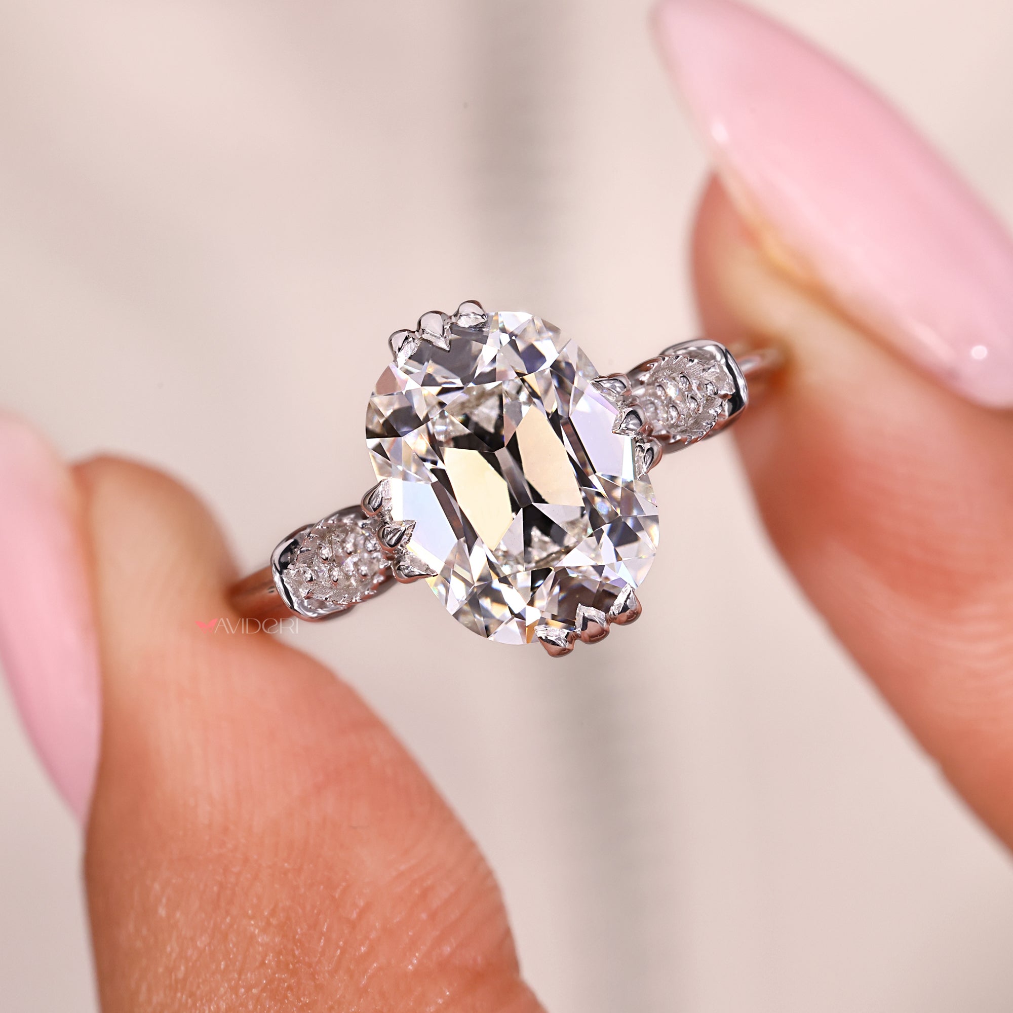 Gift for her – seven diamond engagement ring with claw prong set.