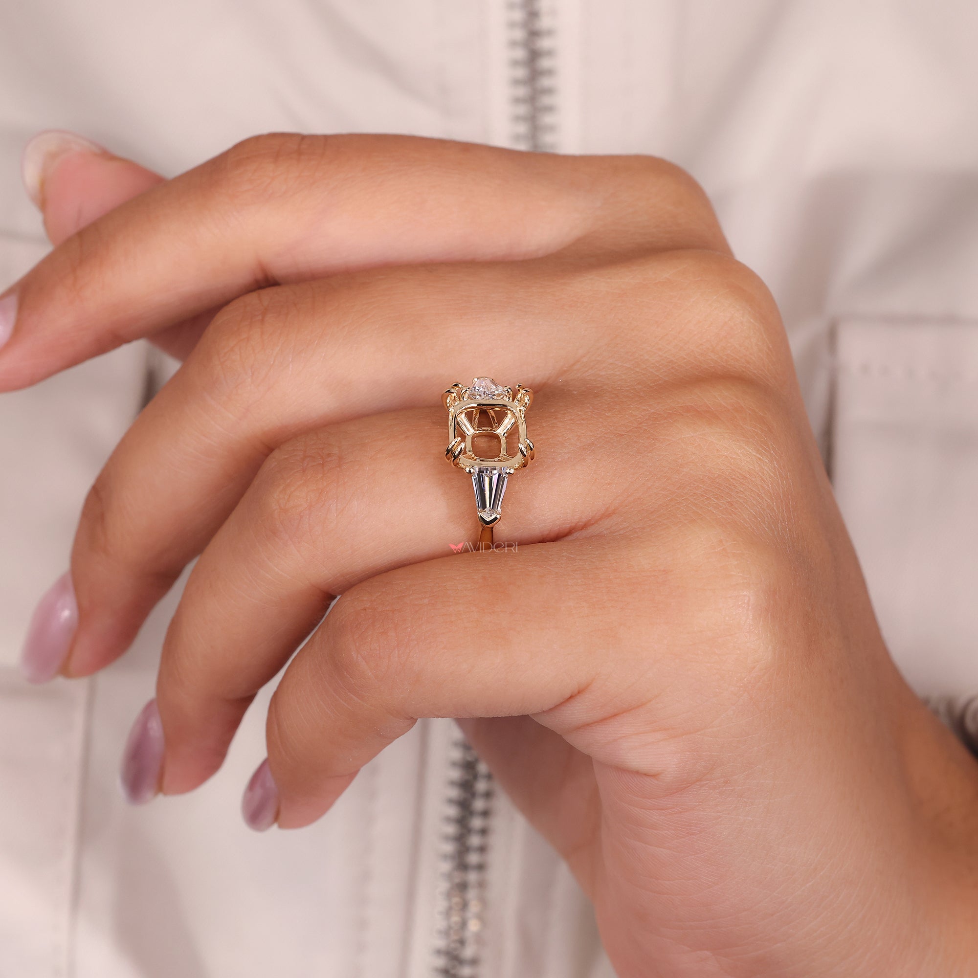 Buy an engagement ring with 3 stone setting.
